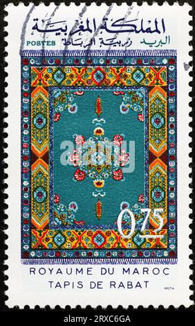 Teppich aus Rabat auf marokkanischer Briefmarke Stockfoto