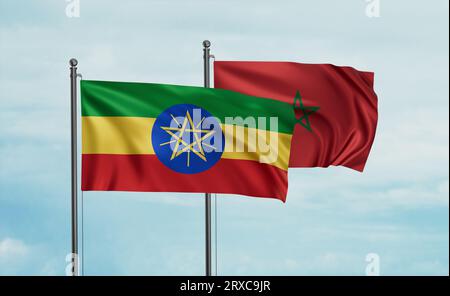 Marokko-Flagge und Äthiopien-Flagge, die am blauen Himmel zusammenwinken, zwei-Länder-Kooperationskonzept Stockfoto