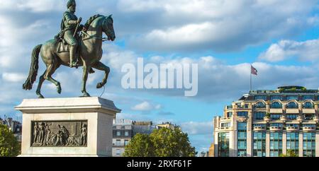 FRANKREICH. PARIS (75) 1. BEZIRK. DIE REITERSTATUE VON HENRI IV., PLACE DU PONT NEUF, AUF DER ILE DE LA CITE, MIT DEM SAMARITAINE-KAUFHAUS I Stockfoto