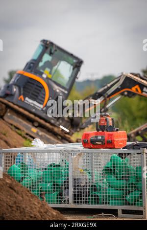 Black Yanmar Mini Raupenbagger bei Erdarbeiten für den Hausbau auf der Baustelle, Deutschland Stockfoto