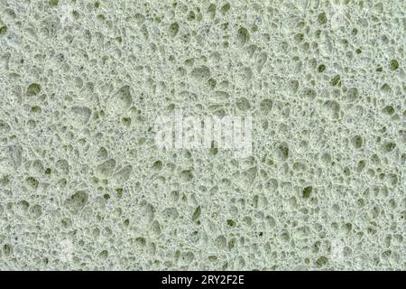 Poröser organischer Schwamm zum Waschen von Geschirr, Textur, Hintergrund. Hochwertige Fotos Stockfoto