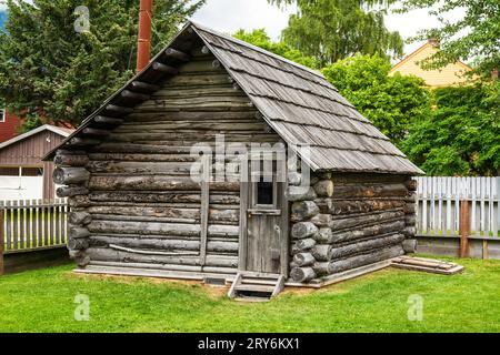 Captain William Moores Blockhütte (1887) war das erste Gebäude, das 10 Jahre vor dem Goldrausch von Klondike in Skagway, Alaska, gebaut wurde. Stockfoto