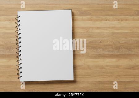 Weißes leeres Notizblock-Blatt-Modell. Spiralförmiger Notizblock auf Holztisch. Draufsicht. Leerzeichen kopieren Stockfoto