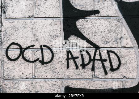 Graffiti-OCD-Zwangsstörung, ADHS-Aufmerksamkeitsdefizit-Hyperaktivitätsstörung. Stockfoto