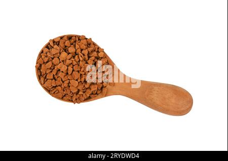 Holzlöffel voller gefriergetrocknetem Instantkaffee Stockfoto