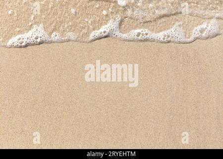 Strand Sand und weiche Wellen Hintergrund Textur Stockfoto