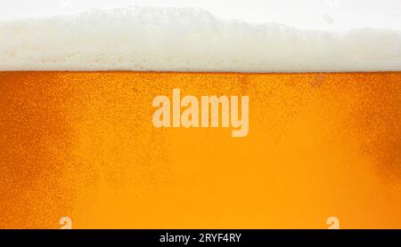 Nahaufnahme Hintergrund von Bier mit Blasen im Glas Stockfoto