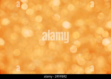 Abstrakter Hintergrund orangefarbener Bokeh-Lichter Stockfoto