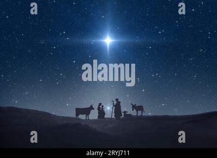 Star of Bethlehem oder Christmas Star. Silhouetten von Jesus Christus, Maria, Joseph und Tieren Stockfoto