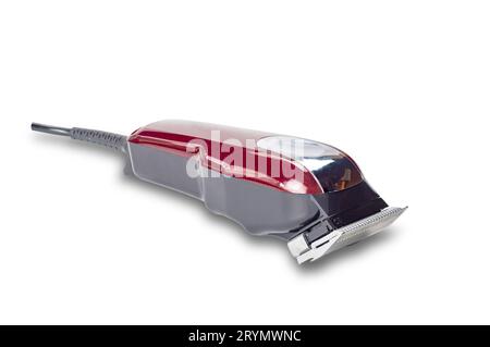 Seitenansicht eines professionellen elektrischen Haarschneiders mit rotem Kabel. Stockfoto