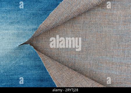 Blaue Jeans mit Denim-Textur oder Loch-on-Denim-Jeans Stockfoto