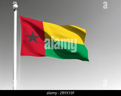 Guinea-Bissau Nationalflagge isoliert winkt auf grauem Hintergrund Stockfoto