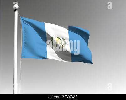 Guatemala Nationalflagge isoliert winkend auf grauem Hintergrund Stockfoto