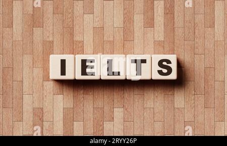 IELTS Wörter aus Holzblöcken mit Buchstaben. Lehrkurse und Prüfungen des Fremdsprachenkenntnisses Englisch. 3D-Illustraten Stockfoto
