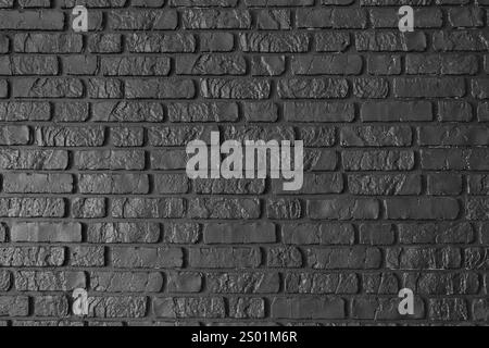 Schwarze alte Backsteinmauern, Architektur Backsteinbau, Mauerwerk aus Steinblöcken. Designelement, Hintergrundbild, Banner Stockfoto