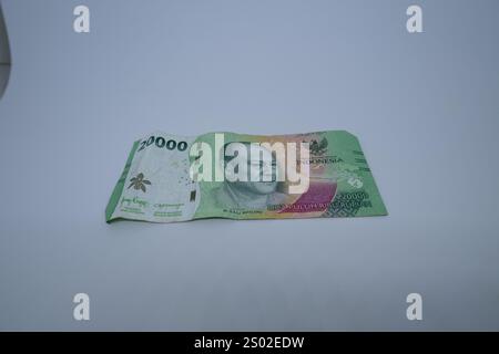 EID-Banknoten und -Münzen aus der Währung der Republik Indonesien Stockfoto