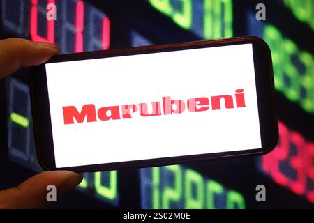 Polen. Dezember 2024. In dieser Fotoabbildung wird das Firmenlogo von Marubeni auf einem Smartphone-Bildschirm angezeigt. Quelle: SOPA Images Limited/Alamy Live News Stockfoto