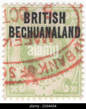 BRITISCHE KRONKOLONIE BECHUANALAND — 1894. Juli: 1 Schilling-grüne Briefmarke mit Porträt von Oueen Victoria. Stempel von Großbritannien in Schwarz aufgedruckt 'BRITISH BECHUANALAND'. Eine britische Kronenkolonie im südlichen Afrika, die das Gebiet des ehemaligen Stellaland umfasste, das 1895 an das Kap der Guten Hoffnung mit der Hauptstadt Vryburg annektiert wurde. Britische Briefmarken wurden bis 1897 auch im Bechuanaland Protektorat verwendet. Victoria (Alexandrina Victoria) war vom 20. Juni 1837 bis zu ihrem Tod 1901 Königin des Vereinigten Königreichs Großbritannien und Irland Stockfoto