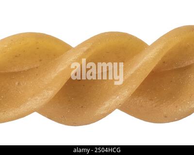 Nahaufnahme von verdrehten, ungekochten Nudelformen in einem goldgelben Farbton. Pasta, Fusilli aus Kichererbsen. Stockfoto
