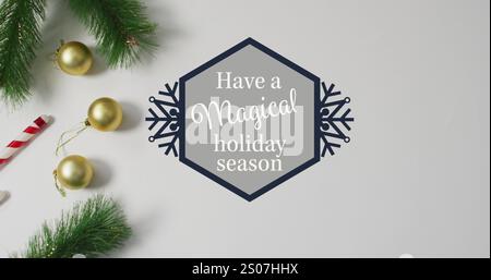 Bild von magischem Text zur weihnachtszeit über weihnachtsdekoration Stockfoto