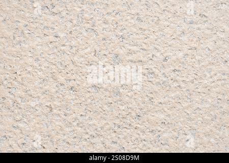 Beige Betonwand Hintergrundstruktur. Hochauflösendes Echtbild. Stockfoto