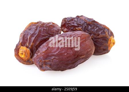 Drei große getrocknete Daten auf weißem Hintergrund Stockfoto