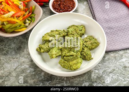 Indische Küche - Green Mint Chicken Tikka Stockfoto