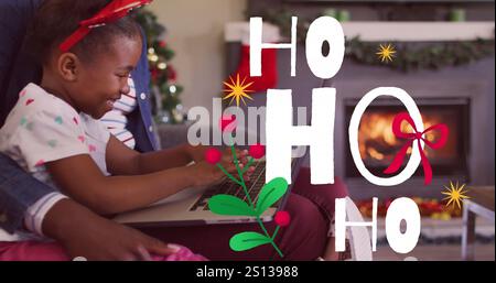 Bild des weihnachtsgrüßtextes über afroamerikanischer Familie zu weihnachten. Weihnachten, Festlichkeit, Feier und Traditionskonzept entstehen digital Stockfoto