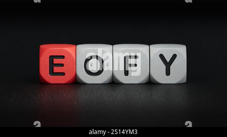 Mehrfarbige Holzwürfel mit dem Text EOFY.Close Up of Wooden Elements,Business Concept.3D-Rendering auf schwarzem Hintergrund. Stockfoto