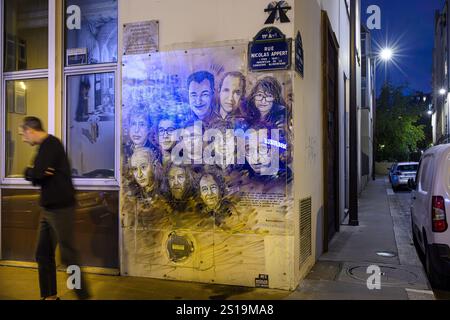 PARIS (75) (11 EME ARRONDISSEMENT) RUE NICOLAS APPERT, L'ARTISTE GRAFFEUR CHRISTIAN GUEMY (ALIAS C215) A PEINT UNE FRESQUE (PROTEGEE PAR UN PANNEAU TR Stockfoto