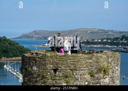 Conwy Wales - July 31 2024; Tourists exploring inside medieval Conwy Castle. Stockfoto