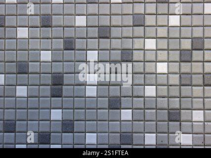 Kleine quadratische Fliesen als Hintergrund Stockfoto