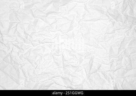 Zerknitterter Hintergrund aus weißem Papier erzeugt ein Strukturmuster Stockfoto