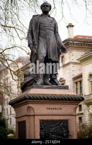 Statue des Entdeckers Sir John Franklin am Waterloo Place, London. Der arktische Entdecker entdeckte die North West Passage, starb aber auf der Reise. Stockfoto