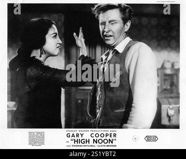 KATY JURADO und LLOYD BRIDGES in einer Szene von HIGH 12 UHR Regisseur FRED ZINNEMANN Story JOHN W. CUNNINGHAM Drehbuch CARL FOREMAN Kinematographie FLOYD CROSBY Gardrobe JOE KING (männlich) und ANN PECK (weiblich) Musik DIMITRI TIOMKIN Song Don't Forsake Me, Oh My Darlin' Music DIMITRI TIOMKIN Lyrics NED WASHINGTON gespielt von TEX RITTER Stanley Kramer Productions / United Artists Stockfoto