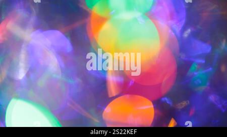 Trendiger abstrakter Hintergrund mit bunten Bokeh-Kreisen mit Farbverlauf und magischem Glühen Stockfoto