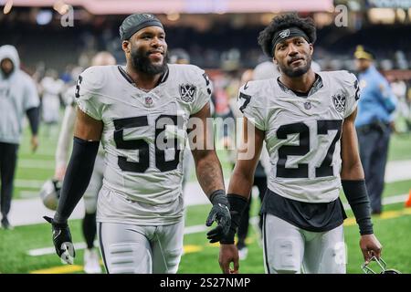 New Orleans, Louisiana, USA. Dezember 2024. 29. Dezember 2024, New Orleans, Louisiana, USA: (Von links nach rechts) Linebacker #56 AMARI BURNEY und Las Vegas Raiders Cornerback #27 SAM WEBB verlassen das Spielfeld, nachdem sie gegen die New Orleans Saints gespielt haben. Die AFC West Raiders (4:12) besiegten die NFC South Saints (5:11) mit 25:10. (Kreditbild: © Dan Anderson/ZUMA Press Wire) NUR REDAKTIONELLE VERWENDUNG! Nicht für kommerzielle ZWECKE! Stockfoto