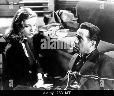 DER GROSSE SCHLAF HUMPHREY BOGART, LAUREN BACALL Datum: 1946 Stockfoto