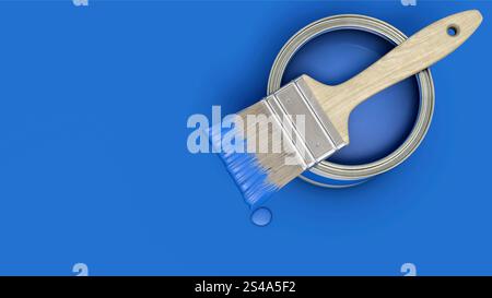 Blaue Farbdose mit Pinsel auf blauem Hintergrund Stockfoto