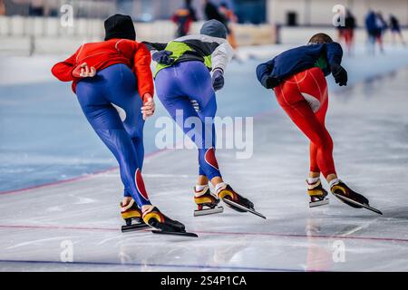 Drei Skater beim Speed-Skating-Training Stockfoto