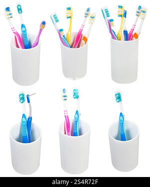 Sammlung von Zahnbürsten in Keramik Brille isoliert auf weißem Hintergrund Stockfoto