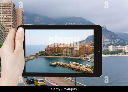 Konzept - Touristen nehmen Foto von Monaco Stadt auf mobile Gadget zu reisen Stockfoto