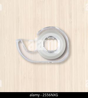 Transparenter Abroller mit Scotch-Klebeband isoliert auf weißem Holzhintergrund. Scotch Tape Spender isoliert auf weißem hölzernem Hintergrund Stockfoto