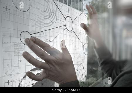 Geschäftsmann Hand arbeiten mit moderner Technik und digitale Ebeneneffekt als Business-Strategie-Konzept Stockfoto