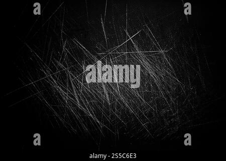Hintergrund mit geschlitzter Textur. Schwarz-weiße Hintergrundtapete. Hintergrund mit geschlitzter Textur. Schwarz-weiße Tapete Stockfoto