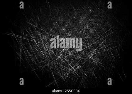 Hintergrund mit geschlitzter Textur. Schwarz-weiße Hintergrundtapete. Hintergrund mit geschlitzter Textur. Schwarz-weiße Tapete Stockfoto