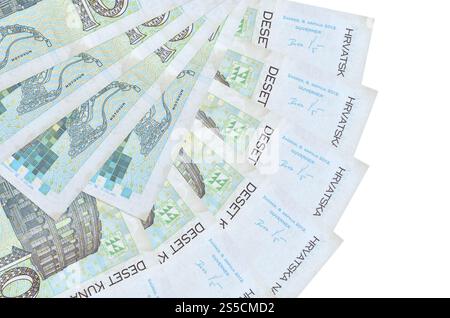 10 kroatische Kuna-Scheine liegen isoliert auf weißem Hintergrund mit einem Kopierraum, der in Fächerform gestapelt ist. Finanztransaktionen. 10 Kroatisch Stockfoto