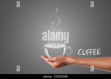 Eine Tasse Kaffee in weißer Kreide in der Hand geschrieben, zeichnen Konzept. Stockfoto