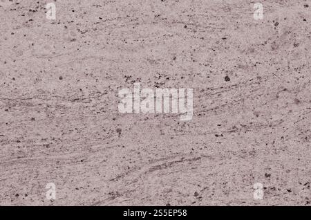 Textur einer massiven und rutschigen beigefarbenen Marmoroberfläche als Material zur Dekoration von Wänden im Innen- und Fassadenbereich in Form von rechteckigen Fliesen. Stockfoto