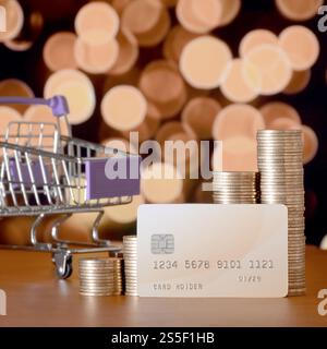 Leerer Warenkorb und Geldstapel im Wachstumsdiagramm auf der beigefarbenen Kreditkarte. Modernes Online-Shopping. Leerer Einkaufswagen und Geldstapel wachsen Stockfoto